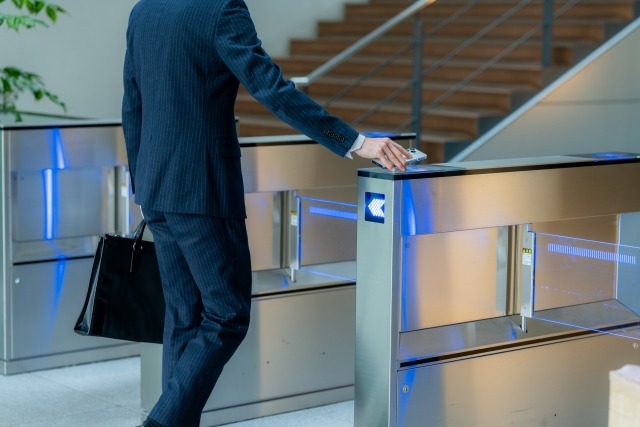 image-of-office-worker-passing-through-security-gate
